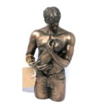 A Continental resin figural study of a father holding his child, H.26cm