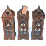 A set of three Gothic style storm lanterns in a verdigris finish, H.50cm (3)