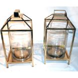 A pair of contemporary gilt metal storm lanterns, H.48cm (2)