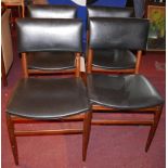 A set of four mid century Danish dining chairs with black leather padded seats, H.81cm