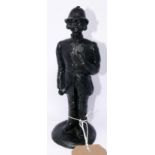 A hand carved coal figure of a Bobby by E&J Collectables Ltd, H.23cm