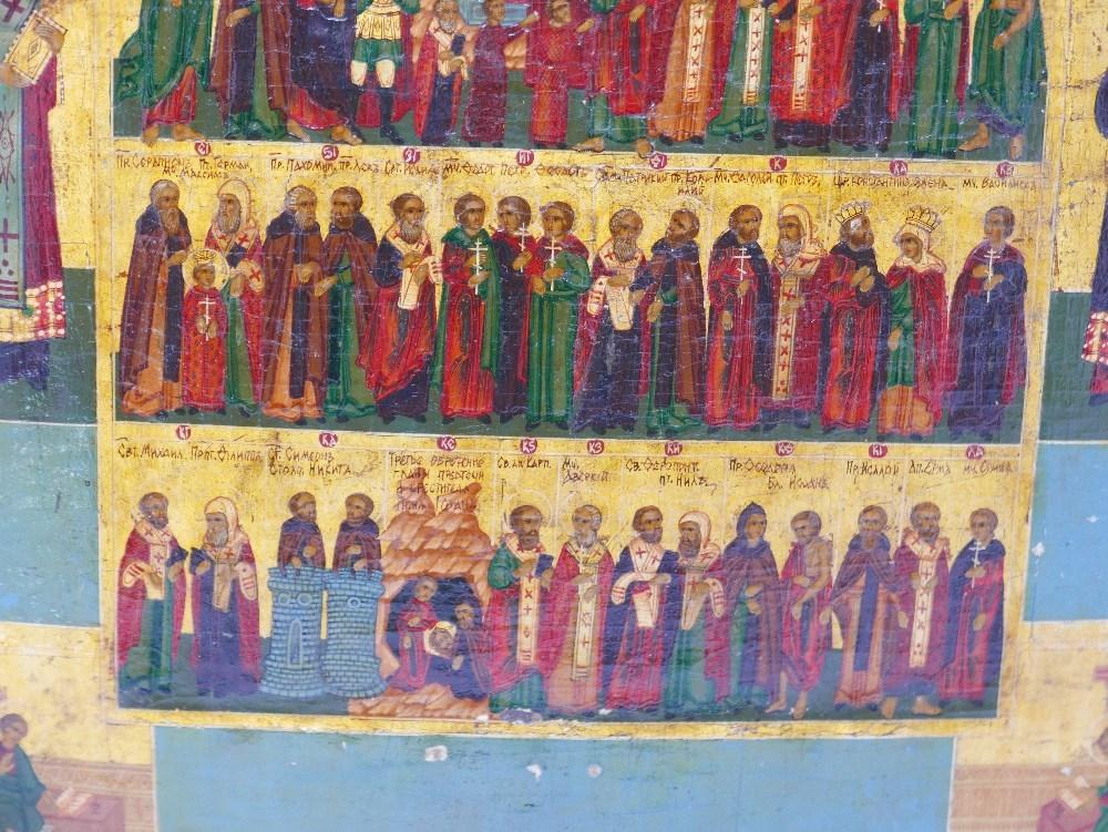 A Russian menological icon depicting selected saints, having religious scenes and saints to - Image 2 of 2