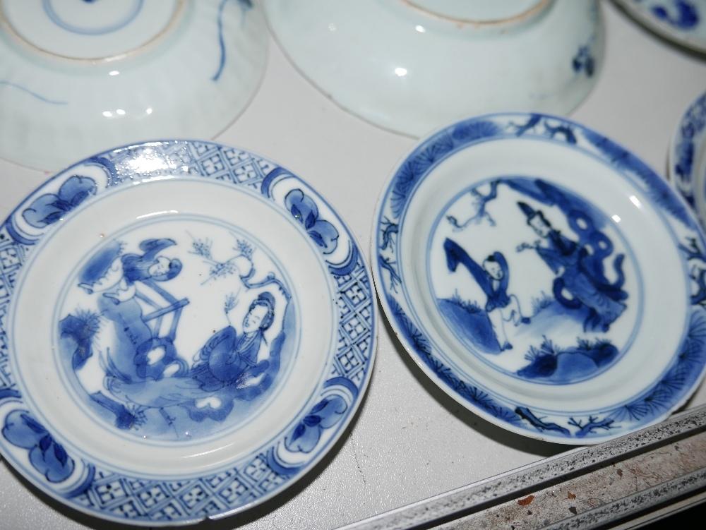 A collection of 18th century Chinese blue and white porcelain to include 1 plate, 11 dishes, 11 cups - Image 3 of 6