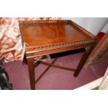 A Georgian style mahogany silver table, in the Chippendale manner, H.62cm L.61cm W.45cm