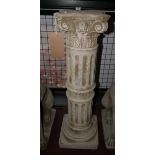 A reconstituted stone Corinthian column, on square base, H.86cm