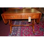 A Georgian style walnut sofa table, with gilt tooled green leather top over twin drawers opposing