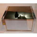 A 1970s Willy Rizzo style chrome and brass side table with smoked glass inserted top, H.37cm W.