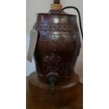 A stoneware cask barrel keg, converted to a lamp, marked Whiskey and with Royal Coat of Arms, on