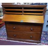 A Victorian mahogany chest, with drop flap enclosing linen drawers, above three drawers, raised on