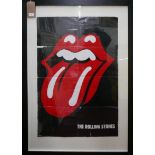 A framed and glazed Rolling Stones poster, 90 x 60cm