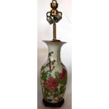 A 19th century Chinese famille rose porcelain vase, decorated with flora and fauna, converted to a