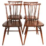 A set of four Ercol stick back dining chairs