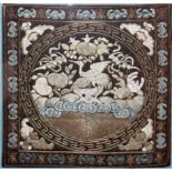 A 19th century Chinese silk embroidery depicting cranes, bats and stylised flowers, framed and