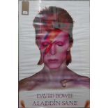 A framed and glazed David Bowie poster, 90 x 60cm
