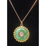 An antique Chinese 9ct yellow gold, green jade and old-cut diamond pendant on 9ct yellow gold chain.