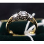 An 18ct yellow gold, three-stone diamond ring, 4.5g, Ring size: M 1/2