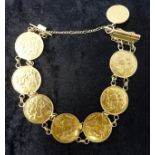 An antique 18ct yellow gold bracelet set with seven 22ct gold half sovereigns and a smaller 22ct