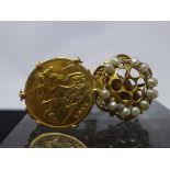 Two large antique 18ct yellow gold rings, one set with a 22ct gold 1915 half sovereign and