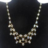 A 14ct yellow gold and natural moonstone cabochon chandelier necklace set with fifty-two oval