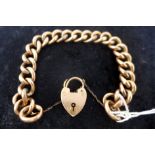 A ladies 9ct rose gold Victorian chunky link bracelet with heart padlock clasp, in original box.