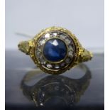 A Georgian 18ct yellow gold old-cut diamond and sapphire cluster ring, the central round faceted