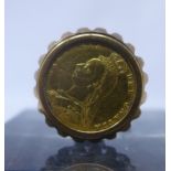 A gold 1897 Victorian half sovereign set in a 9ct yellow gold ring mount. 10.3g