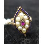 A mid-Victorian 15ct rose gold, dark blue enamel, pearl and ruby ring, the central marquise-shaped