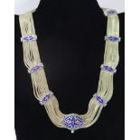 A vintage Russian blue enamel and 900 silver collar necklace composed of rope-twist silver strands