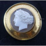 A 19th century yellow gold and circular shell cameo brooch, 4.5g, brooch dia: 3.7cm, cameo dia: 1.