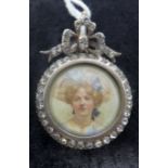A Continental antique silver and white crystal mounted pendant, set with a circular hand-painted