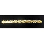 A vintage 9ct yellow gold matte and shiny gold, cross and ball-design, linked bracelet, 16.3g, L: