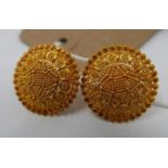 A pair of 22ct gold earrings