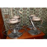 A set of four contemporary candle holders in brushed metal, H.54cm (4)
