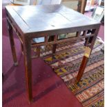 A late 18th/early 19th century Chinese hardwood table, with carved frieze raised on shaped legs, H.