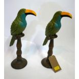 A pair of painted composite parrots on stands, H.45cm (2)