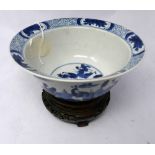 A small Chinese blue and white 'Ladies and Boys' Klapmuts bowl, Kangxi mark and of the period,