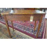 An Edwardian Arts and Crafts oak metamorphic writing desk 'The Britisher Patent Writing Table',