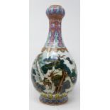 A Chinese porcelain deer vase, the garlic mouth and neck decorated with stylised flowers, the body