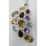 A large sterling silver gem-set palmette pendant, collet-set with faceted garnet, smokey quartz,