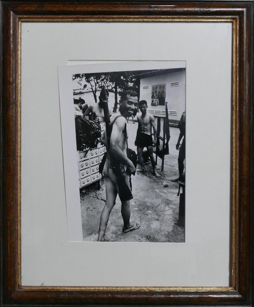 Don McCullin (British, b.1935), Cambodia 1970, a Cambodian soldier wearing a gun, silver gelatin - Image 2 of 2