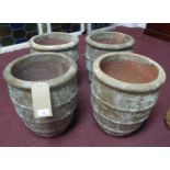 Four small terracotta planters in the Atlantis style finish, H.37cm Diameter 31cm (4)