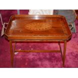 An Edwardian Sheraton Revival mahogany tray top table, profusely decorated with marquetry inlay