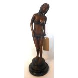 A bronze statue of a semi nude female, raised on marble base, H.54cm