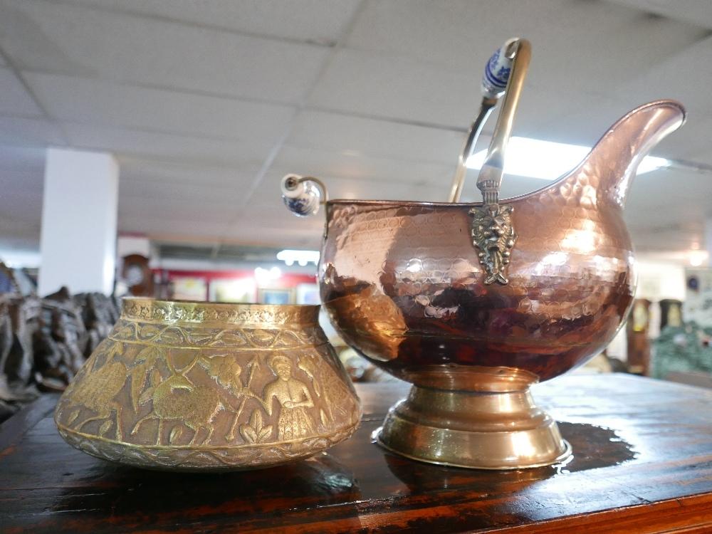 A Dutch copper coal scuttle together with a Javanese brass bowl