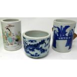 Three 19th century Chinese porcelain brush pots to include a blue and white example decorated with