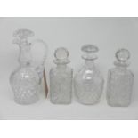 Four decanters (tallest H.28cm and with chips to stopper)