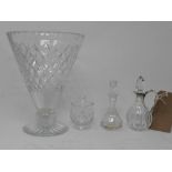 A large signed crystal vase, together with white metal mounted crystal jug, glass scent bottle,