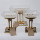 A set of three 20th century gilt metal and glass comports, H.24cm