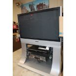 A PANASONIC VIERA TV ON STAND, TOGETHER WITH DVD PLAYER, ETC