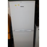 A SMALL AMICA FRIDGE FREEZER